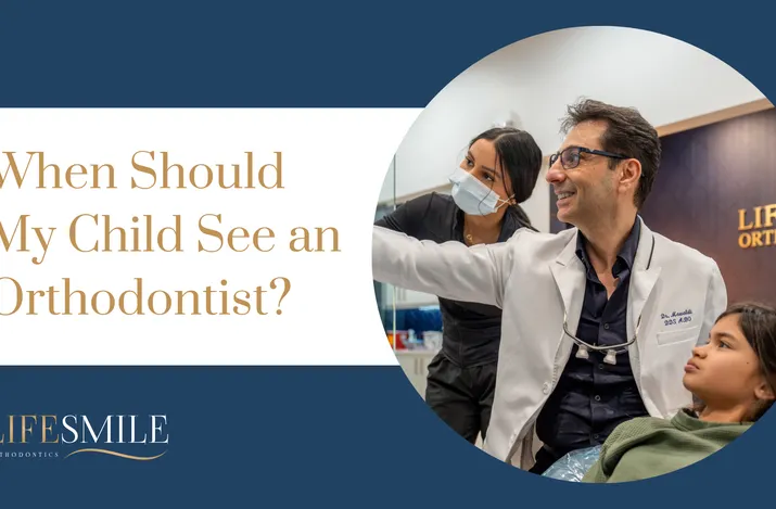 Child with braces at orthodontist