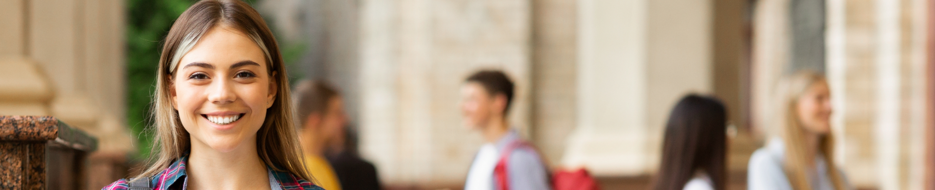Teens with Invisalign and braces smiling